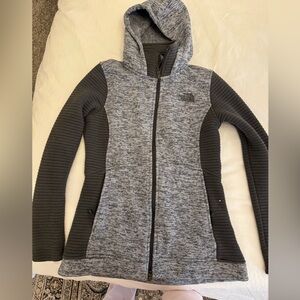 The North Face jacket maybe used once in like new quality. Really warm material